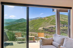 View of mountain backdrop featuring a large body of water