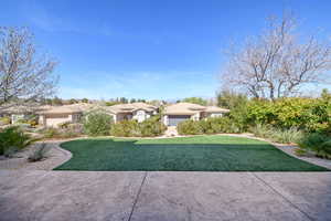 View of grassy yard featuring a residential view