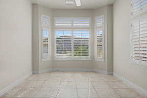 Unfurnished room with baseboards