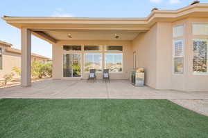 View of patio featuring area for grilling