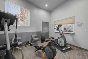 Exercise area featuring recessed lighting