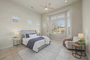Bedroom featuring a ceiling fan, recessed lighting, and light tile patterned floors