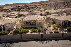 Aerial perspective of suburban area with a mountain backdrop