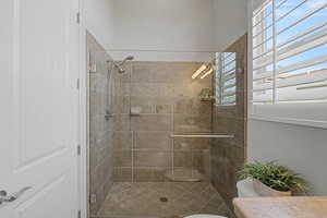 Full bathroom with a stall shower and vanity