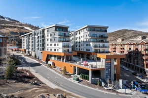 View of apartment building / complex with a mountain view