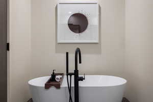 Full bath featuring a freestanding bath