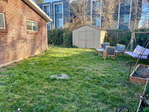 Unit 4367 View of yard featuring a shed and a vegetable garden