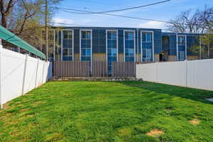 View of fenced backyard