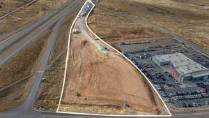 Aerial view of property and surrounding area with property boundaries highlighted