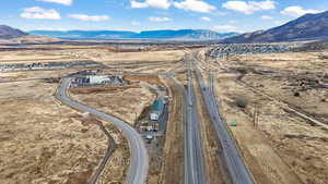 Bird's eye view of a mountainous background and a desert landscape
