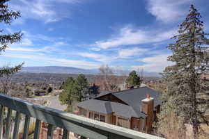 Mountain view featuring nearby suburban area