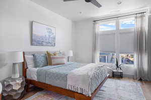 Bedroom featuring wood finished floors and a ceiling fan