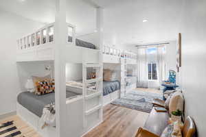 Bedroom featuring light wood finished floors and recessed lighting