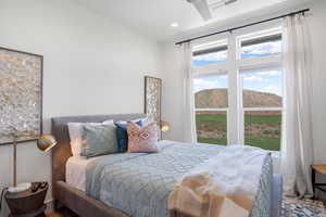 Bedroom featuring a mountain view and recessed lighting