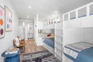 Bedroom featuring recessed lighting and light wood-type flooring
