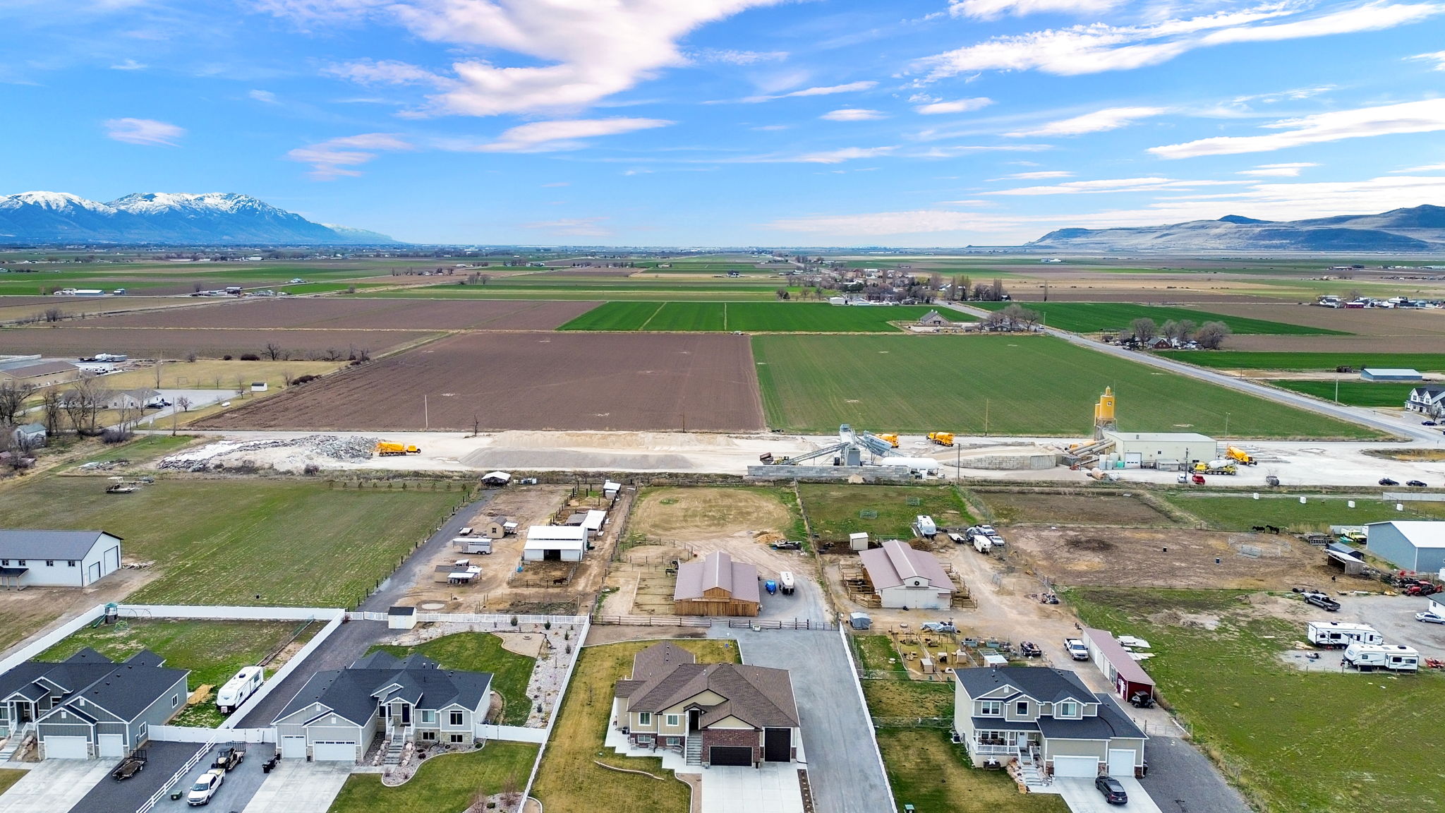 Overview of rural landscape featuring mountains and farmland