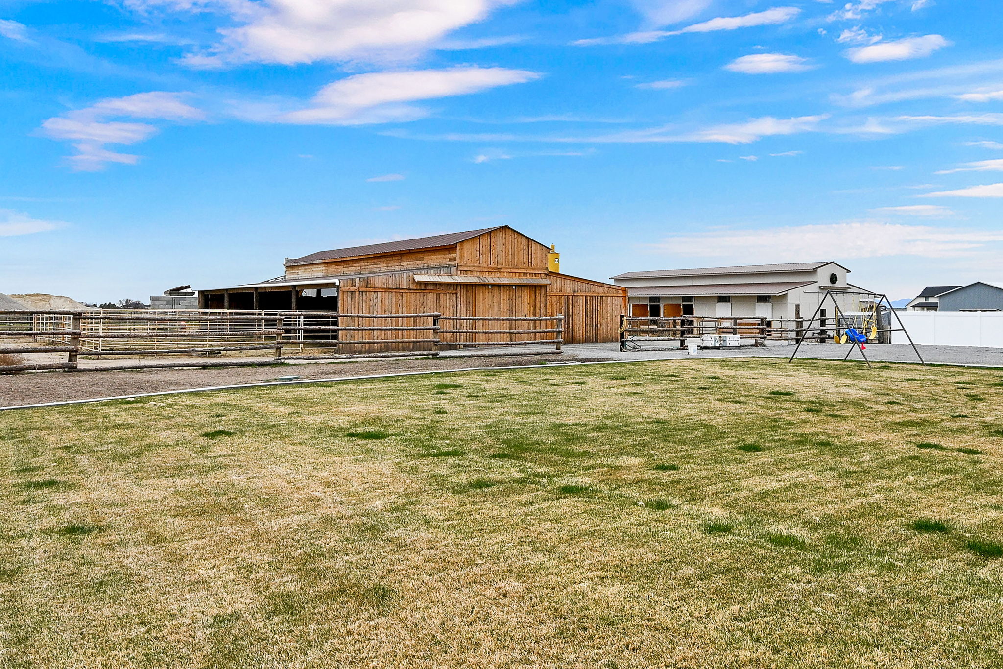 View of yard featuring an outbuilding and an exterior structure