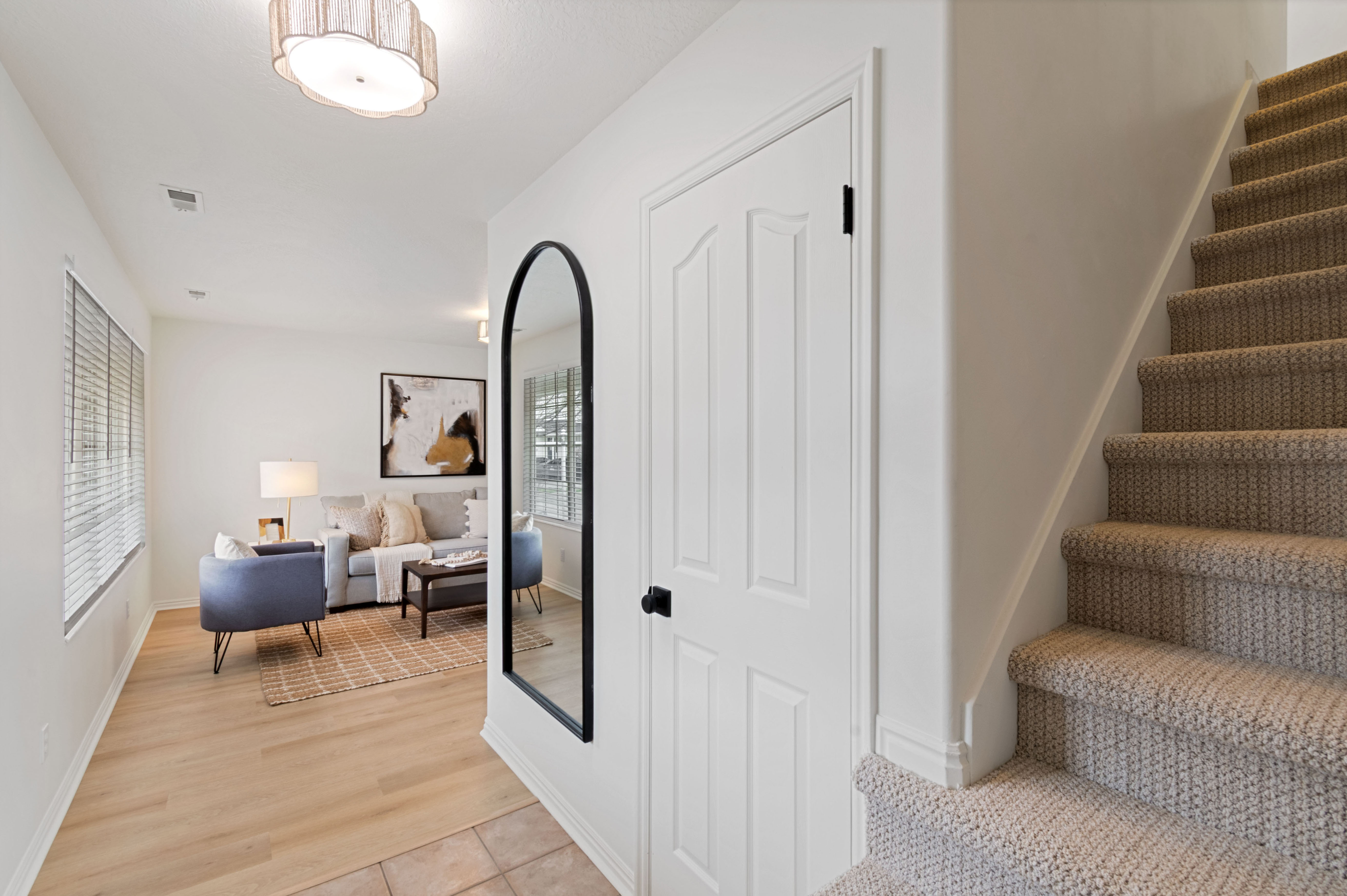 Stairs featuring baseboards and wood finished floors