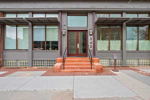 Property entrance featuring french doors
