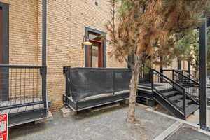 Property entrance with brick siding