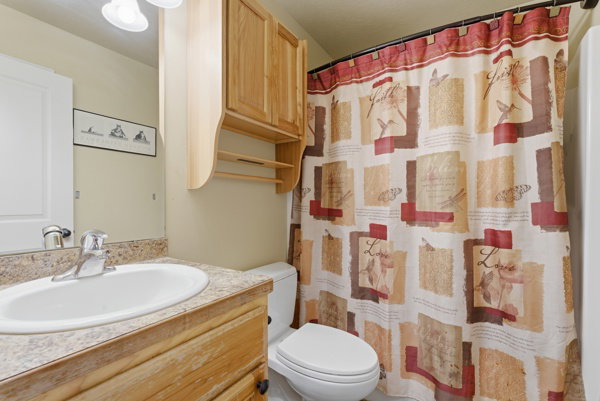 Full bath with vanity and a tub/shower