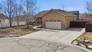 View of home's exterior with large RV parking