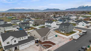 Aerial view of residential area with a mountainous background