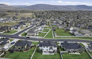 Aerial view of residential area with a mountain backdrop