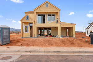 Property in mid-construction featuring a patio and a mountain view