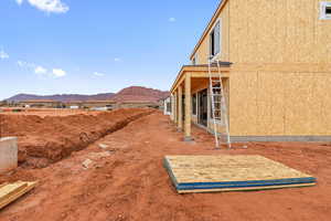View of yard featuring a mountain view and a patio