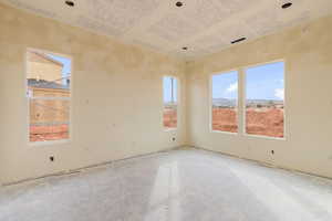 Unfurnished room featuring healthy amount of natural light