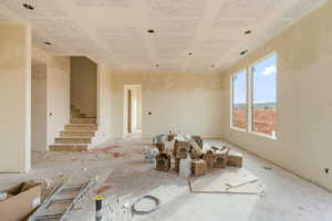 Spare room featuring stairway