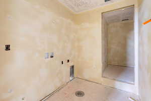 Laundry room with hookup for a washing machine