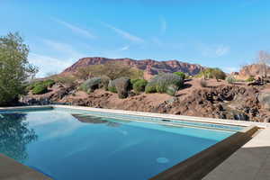 Outdoor pool with a mountain view