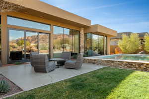 View of patio featuring a mountain view and an outdoor pool