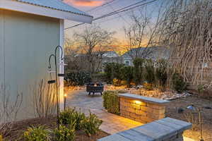 View of patio / terrace featuring a fire pit