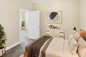 Bedroom featuring baseboards and carpet flooring