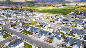 Aerial view of residential area featuring mountains
