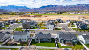 Aerial view of residential area featuring mountains
