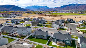 Aerial view of residential area featuring a mountain backdrop