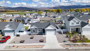 Aerial view of residential area featuring mountains