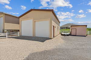 Detached garage with a storage shed
