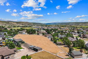 Aerial perspective of suburban area featuring mountains
