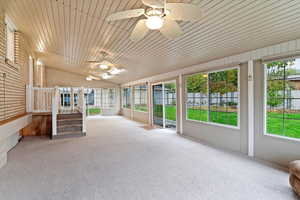 Enclosed sunroom with ceiling fans