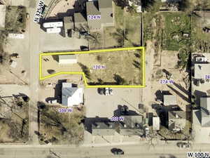 Aerial map of property and surrounding area with property parcel outlined
