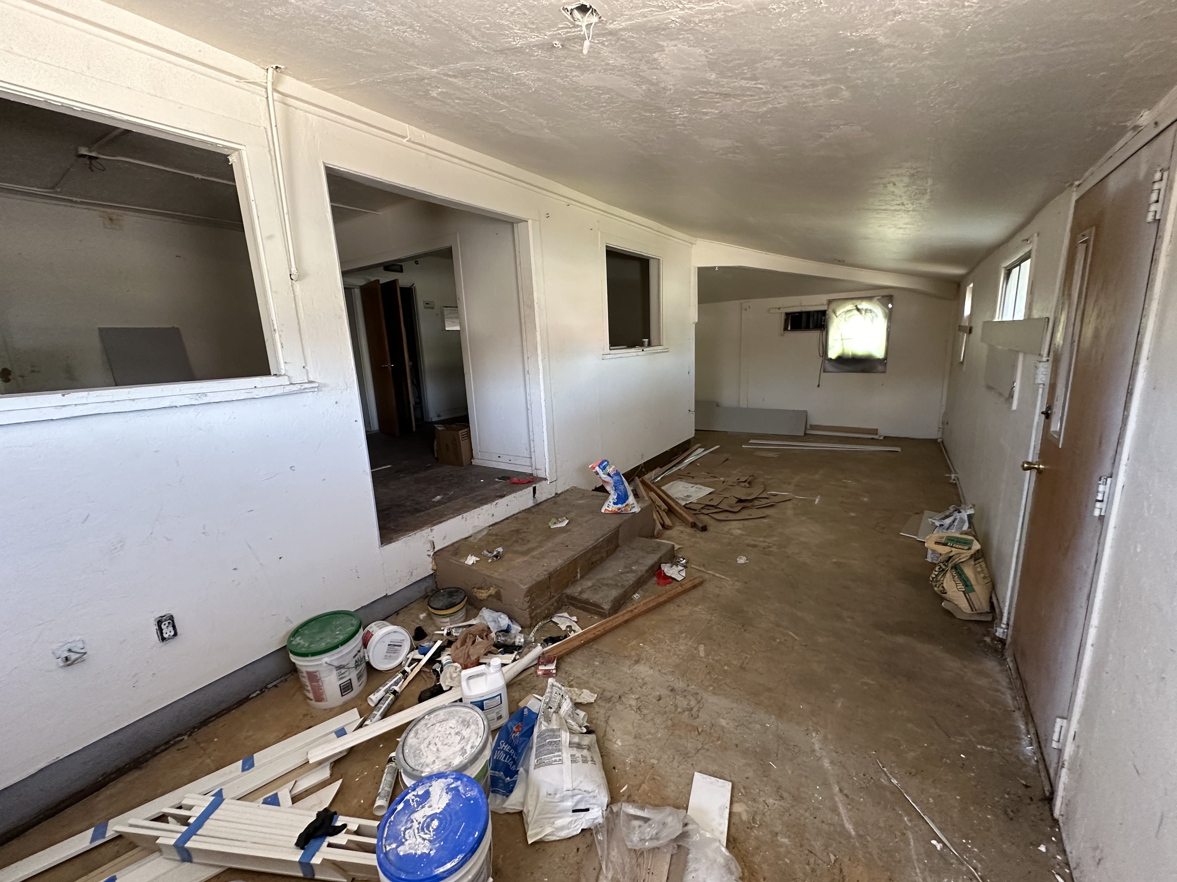 Unfurnished room with a textured ceiling