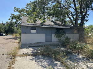 View of front of house featuring roof with shingles