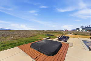 Wooden terrace featuring a mountain view