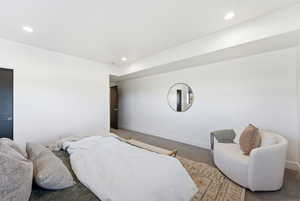 Bedroom with recessed lighting and carpet floors