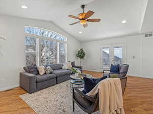 Living room with recessed lighting, french doors, a ceiling fan, and light wood-style floors